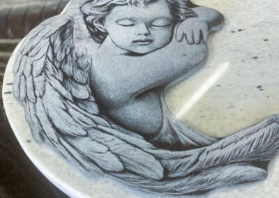 tablica z aniołkiem nagrobek